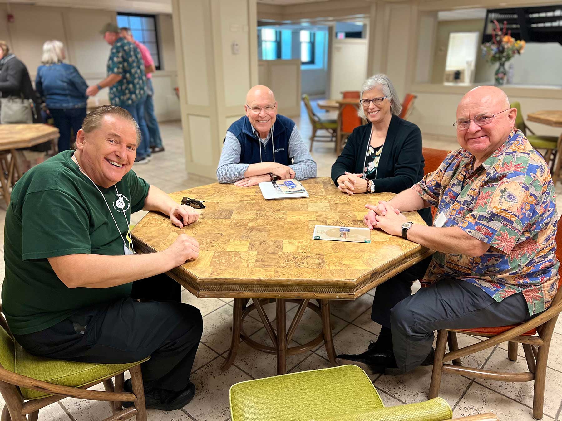 A group of Divine Word Alumni pose for a photo